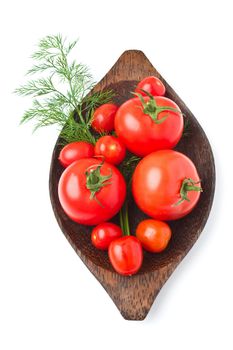 tomato and dill on a plate and white background 