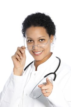 Smiling attractive African American female doctor pointing towards the camera with her finger isolated on white