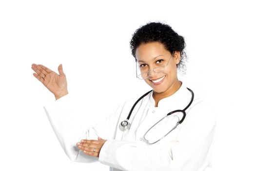 Smiling confident African American woman doctor pointing with her hand towards blank copy space isolated on white