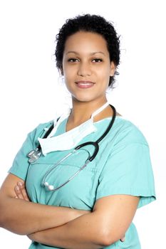 Confident young female African American doctor or nurse standing smiling at the camera with folded arms isolated on white
