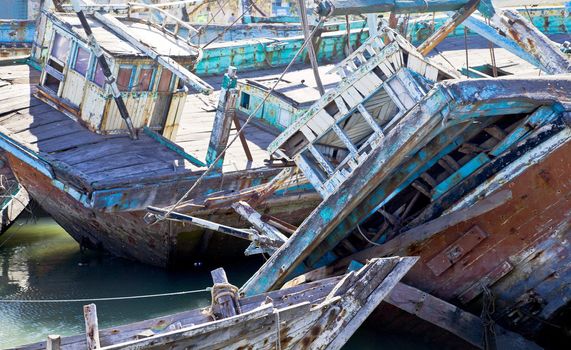 Dwarka Roadtrip. Boat graveyard in Gujarat India of wooden shipping that has been shipwrecked or taken out of service