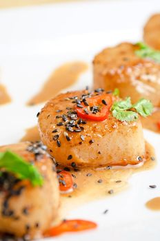 Close up Scallop seafood appetizer with spices