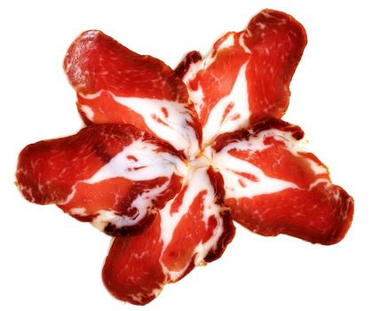 five slices of dried smoked meat over white background