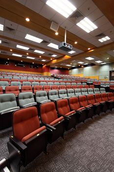 Lecture hall with colorful chairs in a university