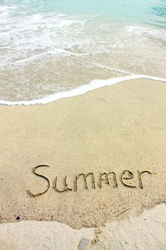 Summer words on sand