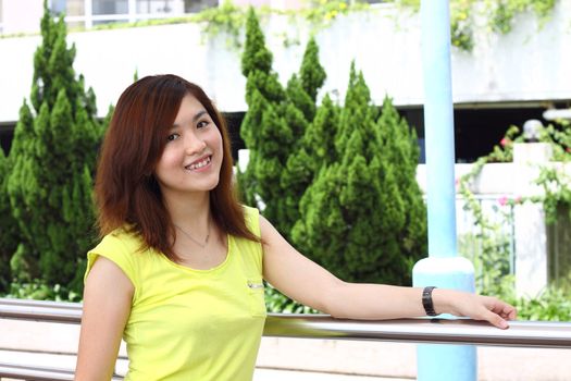 Asian woman smiling outdoor