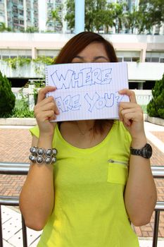 Asian woman with "where are you" words
