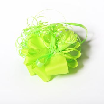 Green gift bow - on a white background - square
