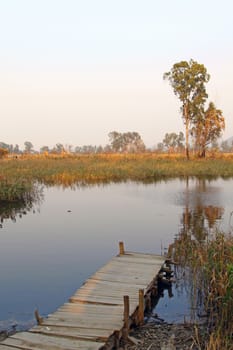 Lake with wooden pier