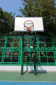 Basketball court in sunny day