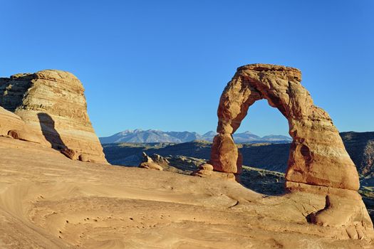 horizontal view of sunset at Delicate Arch, USA