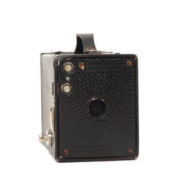 Old vintage box camera in detail on white background  