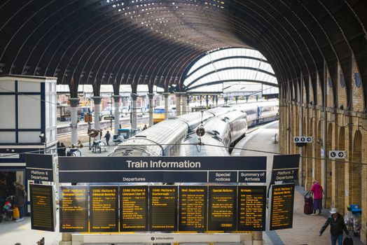 YORK, UK - MARCH 29: Train information display at York Railway Station. Inaugurated in 1877 and bombed during WW2, it is one of the most important railway junctions in the British network. March 29, 2013 in York.