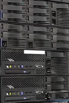 servers stack with hard drives in a datacenter for backup and data storage