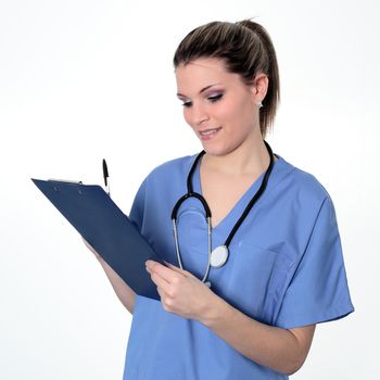 beautiful woman doctor with pen and stethoscope in studio