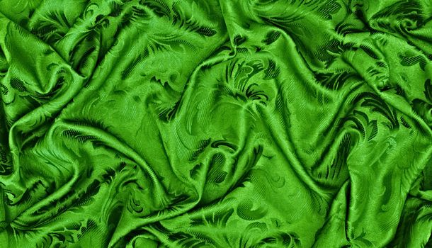 abstract background green silk fabric with waves
