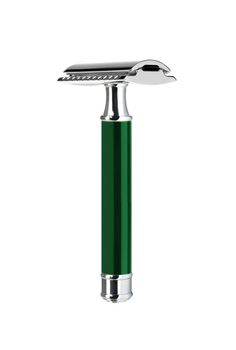 Closeup of green shaving blade on white surface