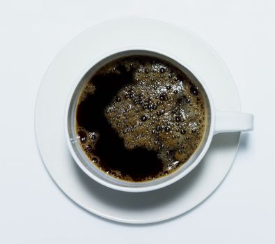 Black Coffee in White Cup. White Background