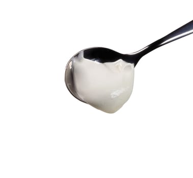spoon with yogurt.