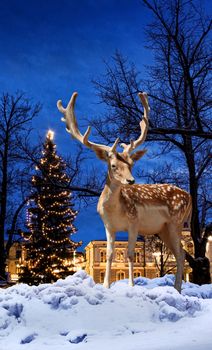 Christmas deer small town Xmas tree background