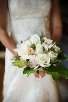 Woman holding a wedding bouquet