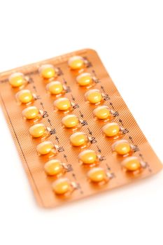 tablets (Birth Control Pills) on a white background