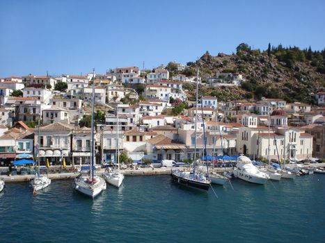 Poros port and a quay with yachts                               