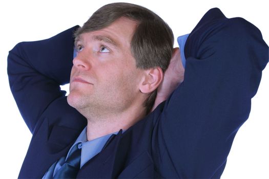 Handsome businessman relaxing in his chair, thinking