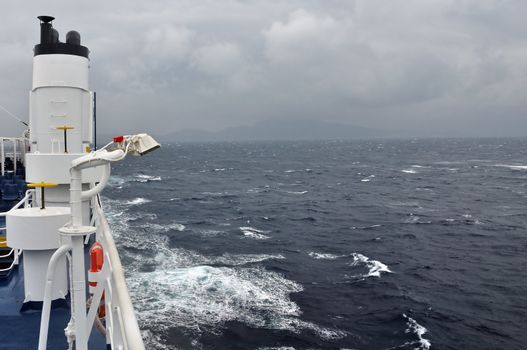 Sea and cloudy sky horizon from ferry boat deck. Arrival on the island of Zakynthos.