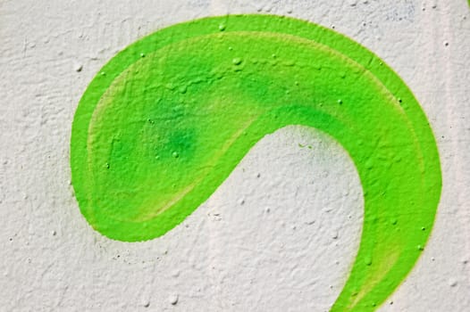 Wall with green paint curve shape. Abstract texture.