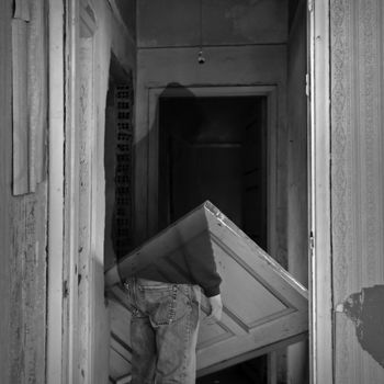 Ghost in the haunted hallways of an abandoned house.