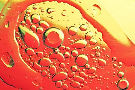 Oil drops on a water surface