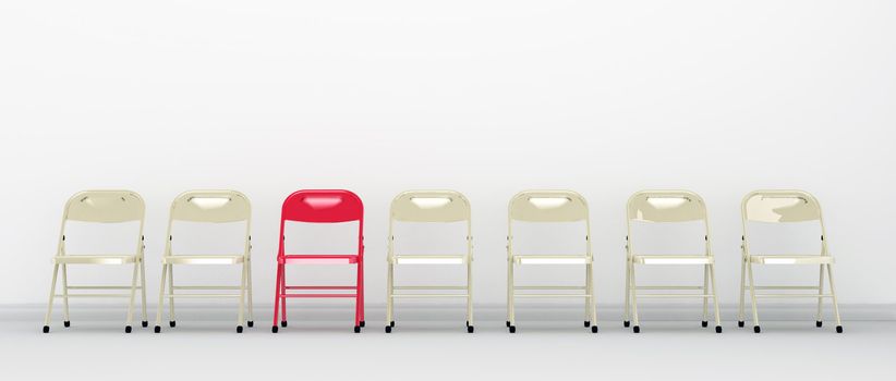 Standing out among others. Red chair standing out in a row of other chairs against a white wall