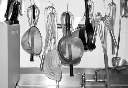 Kitchen strainers inside a restaurant.