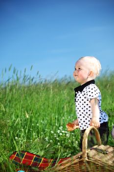  picnic on green grass boy and basket