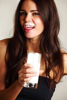 woman drink yogurt close up