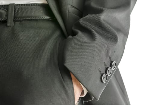 Closeup of businessman hand in his suit pocket. With copy space.