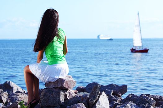 woman relax blue sea and ship on background