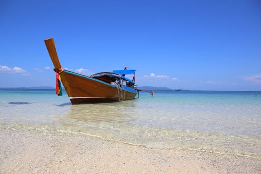 long tail boat sit on the beach,Lipe island, Thailand