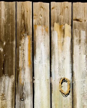 Old wooden rural house wall made of plank board backdrop background.