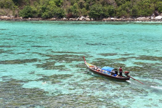 Traditional Thai longtail boat at the beach