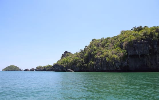 Tropical sea island rock, Thailand krabi shore line, island in sea