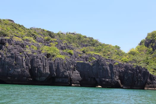 Tropical sea island rock, Thailand krabi shore line, island in sea