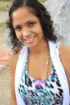 African American female beauty posing outside.