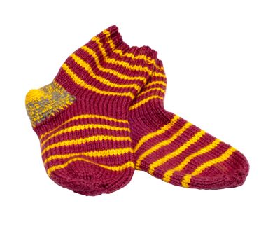 Pair of knitted woolen socks it is isolated on a white background.