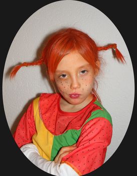 Photo of a girl to the children's Carnival, disguised as Pipi Longstocking.