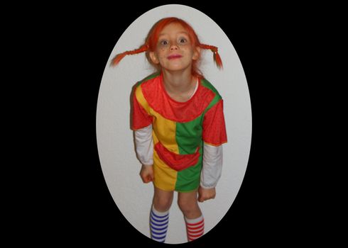Photo of a girl to the children's Carnival, disguised as Pipi Longstocking.