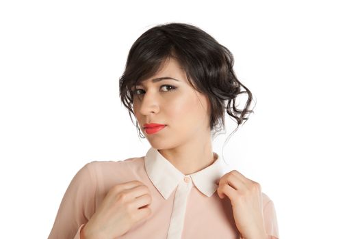 Portrait of a woman in a pink blouse on a white background isolated