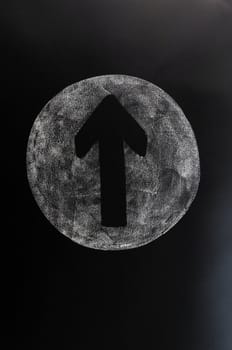 Arrow of up drawn on a blackboard