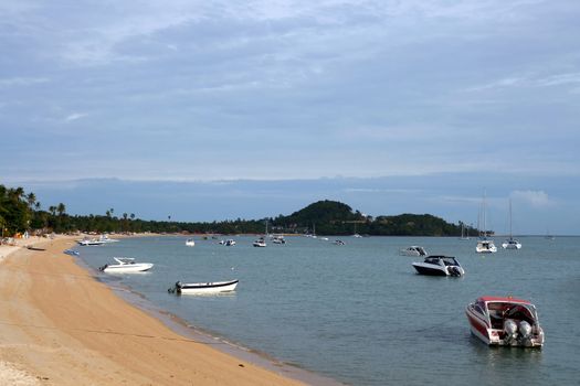 Samui Beach with Speed Boat and sail